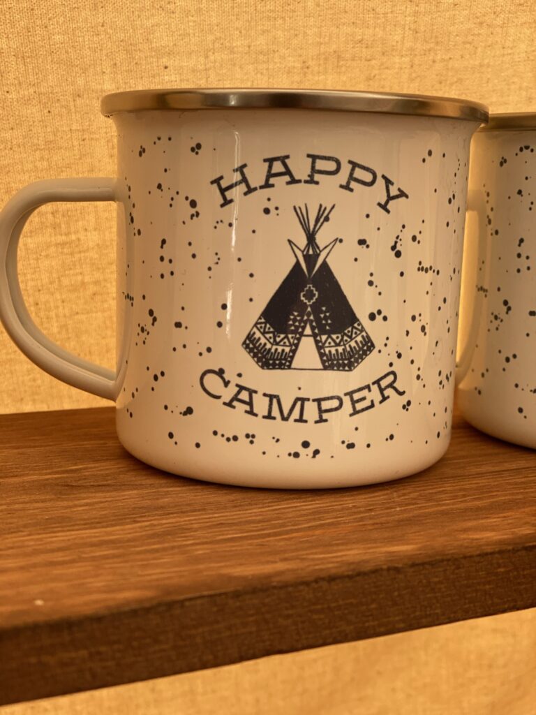 Happy Camper mug in Tipi at Lost Indian Camp